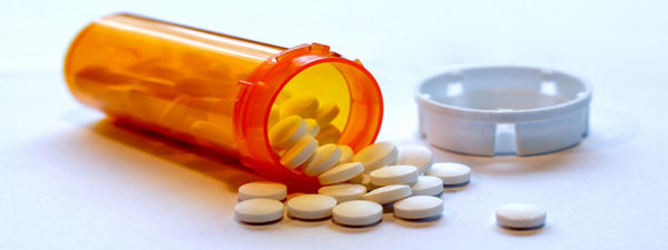Prescription bottle with opioid pills