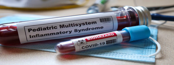 Vile that says Multisystem Inflammatory Syndrome and another vile that says COVID-19