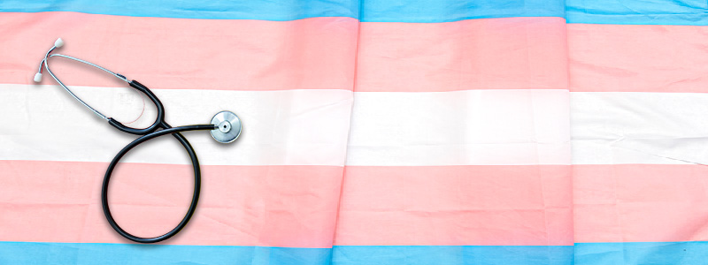 stethoscope over transgender flag