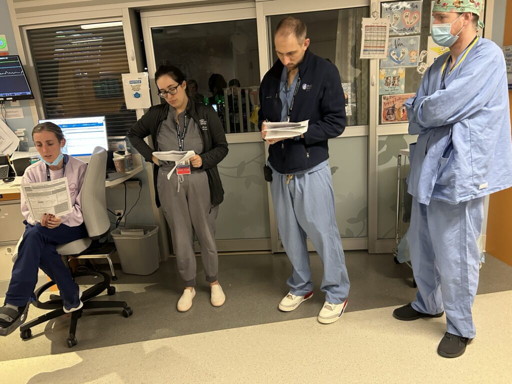 Department of Surgery fellows look over notes